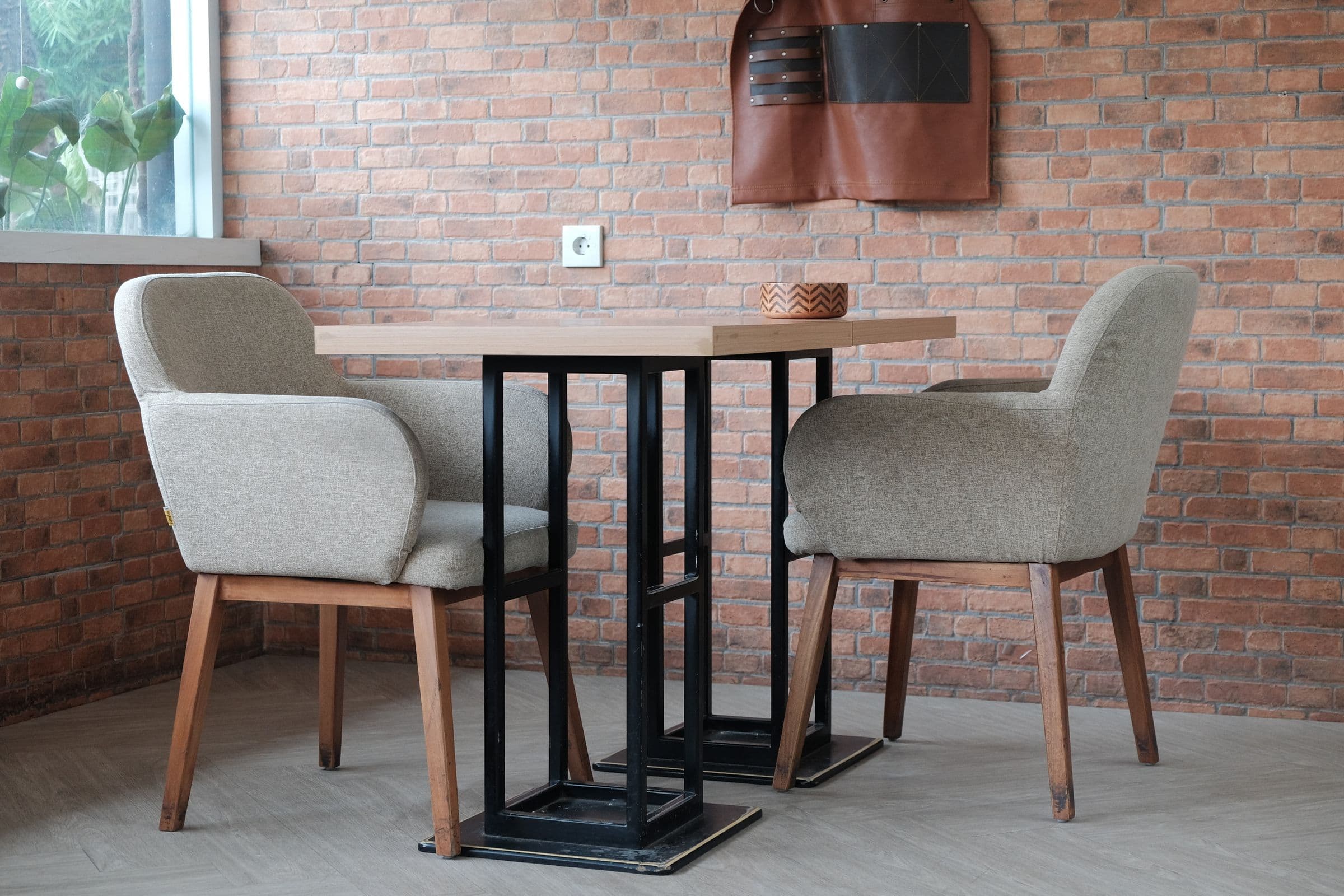 Upholstered dining chairs at a wooden table